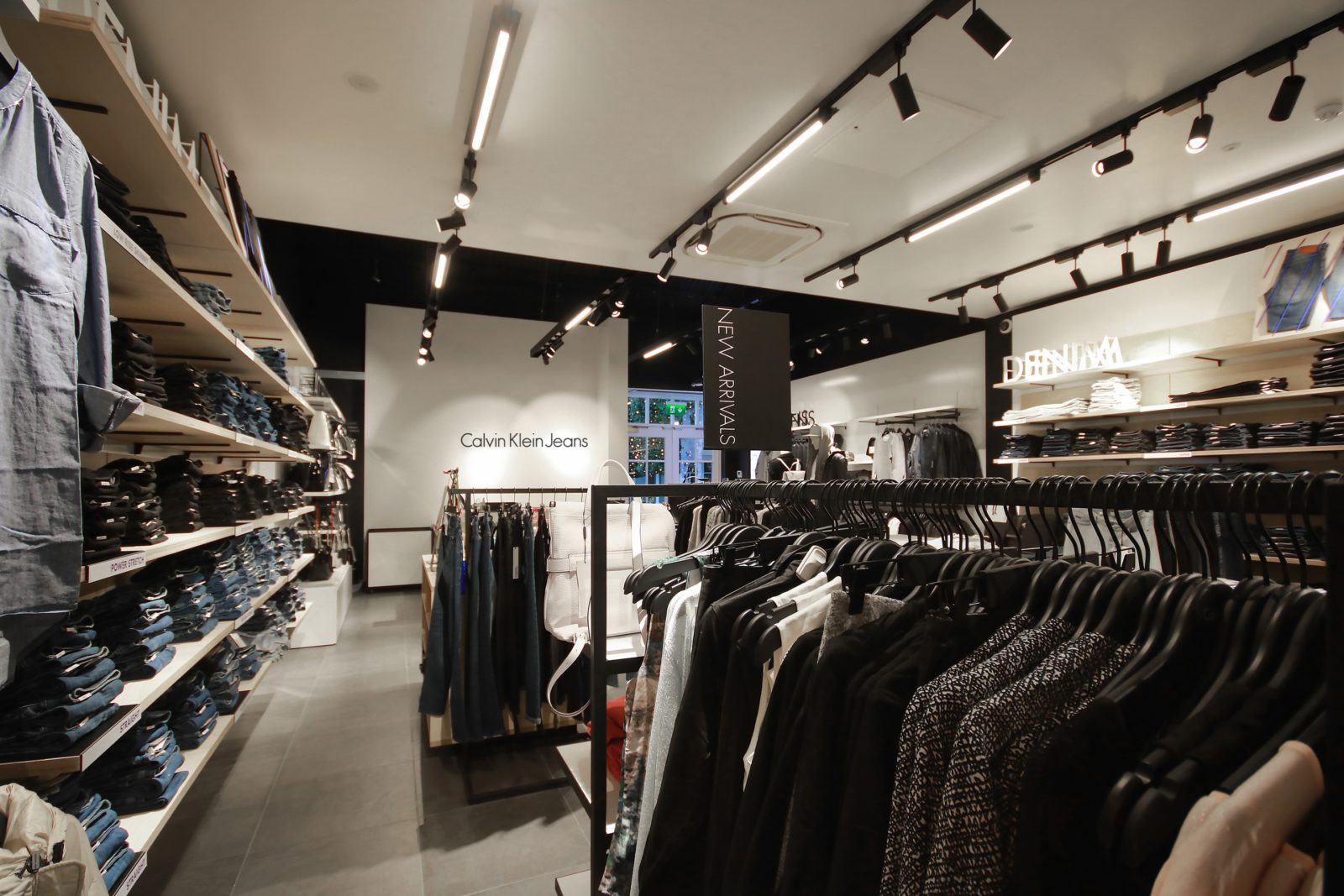 CALVIN KLEIN JEANS CLOTHING ON DISPLAY INSIDE THE FASHION STORE